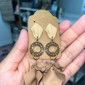 Beautiful earrings in color moca brown and brawn. Fashion.